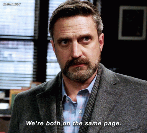 A Man With A Beard And A Suit Says We 'Re Both On The Same Page GIF
