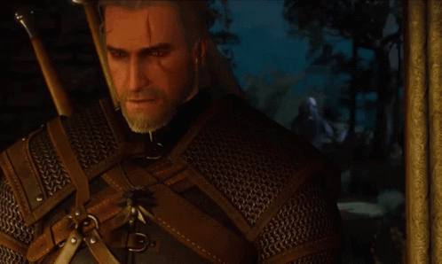 A Man With A Beard And A Sword Is Standing In Front Of A Picture Frame GIF