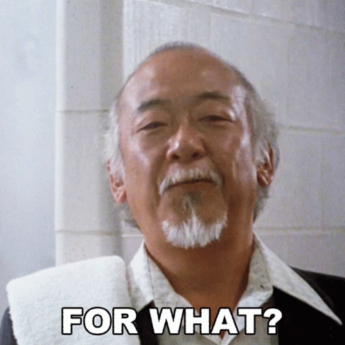 A Man With A Beard And A Towel Says " For What " GIF