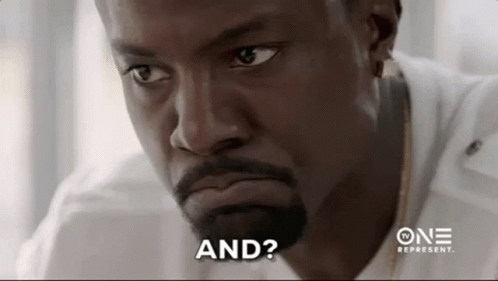 A Man With A Beard And A White Shirt Is Making A Funny Face And Saying `` And ? '' GIF