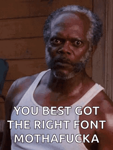 a man with a beard and a white tank top says you best got the right font mothafucka