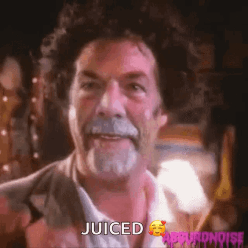 A Man With A Beard And Curly Hair Says Juiced On The Screen GIF