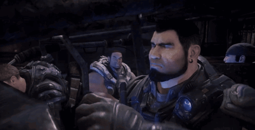 A Man With A Beard And Ear Piercings Is In A Video Game GIF