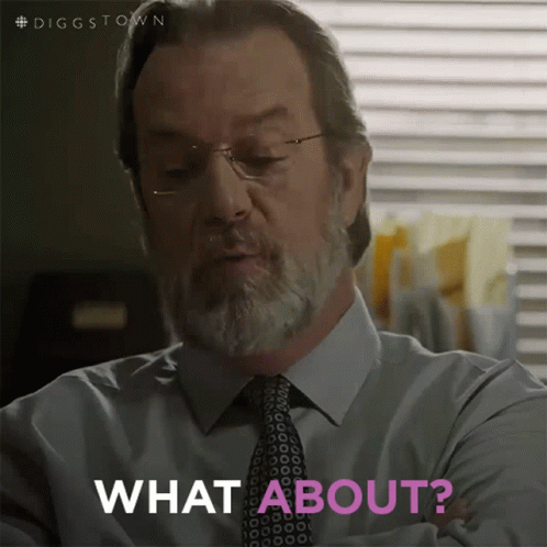 A Man With A Beard And Glasses Is Asking What About GIF