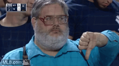 A Man With A Beard And Glasses Is Giving A Thumbs Down Sign GIF
