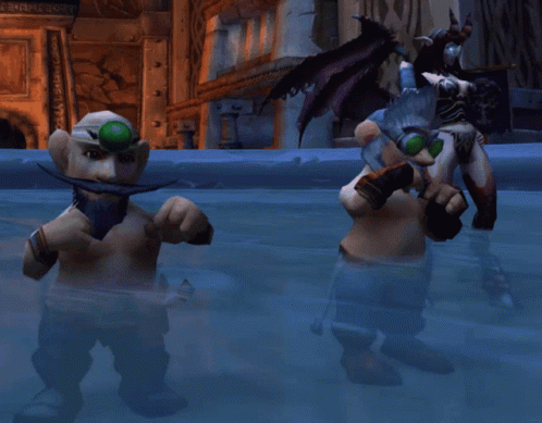 A Man With A Beard And Goggles Is Standing In A Pool Of Water Next To Another Man GIF