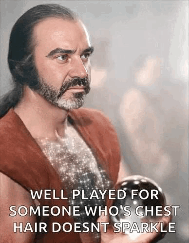 A Man With A Beard And Long Hair Is Holding A Ball In His Hand And A Quote . GIF
