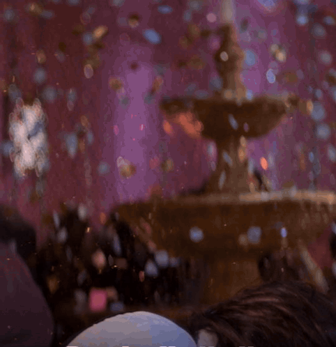 A Man With A Beard And Long Hair Is Laying On His Back GIF