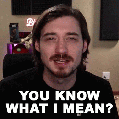 A Man With A Beard And Mustache Is Asking You Know What I Mean GIF
