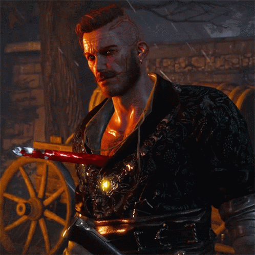 A Man With A Beard And Mustache Is Holding A Bloody Sword GIF