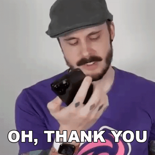 Man With Beard And Mustache Holding Cell Phone GIF