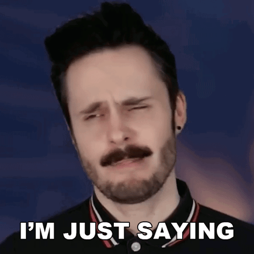 A Man With A Beard And Mustache Is Making A Funny Face And Says `` I 'M Just Saying '' . GIF