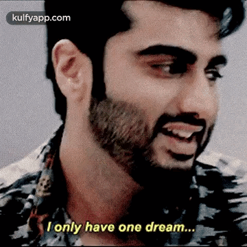 A Man With A Beard And Mustache Is Smiling And Saying `` I Only Have One Dream ... '' GIF