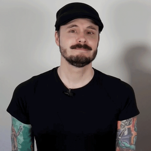 Man With Beard And Mustache Wearing Black Hat GIF