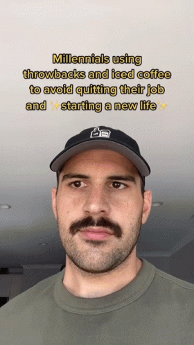 A Man With A Beard And Mustache Is Wearing A Hat With The Words Millenials Using Throwbacks And Iced Coffee GIF