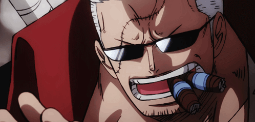 A Man With A Beard And Sunglasses Is Smoking A Cigar GIF