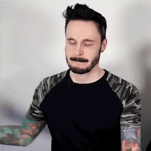 Man With Beard And Tattoos Wearing Black Shirt GIF