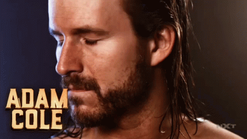 Man With Beard And Adam Cole Name On Chest GIF
