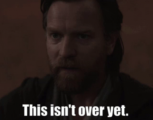 A Man With A Beard And The Words This Isn 'T Over Yet GIF