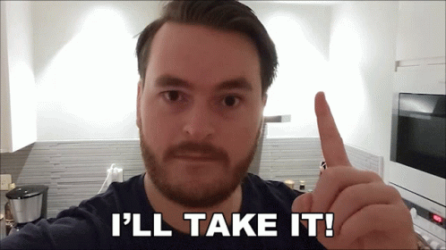 A Man With A Beard Giving A Thumbs Up With The Words I 'Ll Take It Below Him GIF