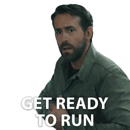 a man with a beard has the words get ready to run above him