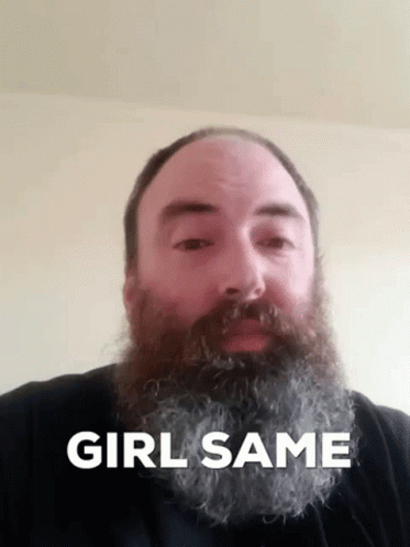 A Man With A Beard Has The Words Girl Same On His Face GIF