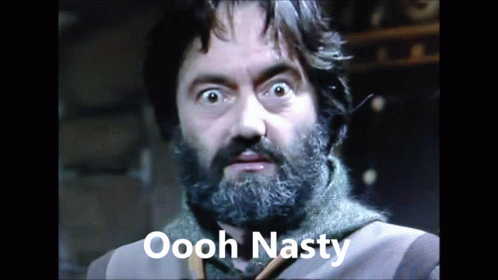 A Man With A Beard Has The Words Oooh Nasty Written On His Face GIF