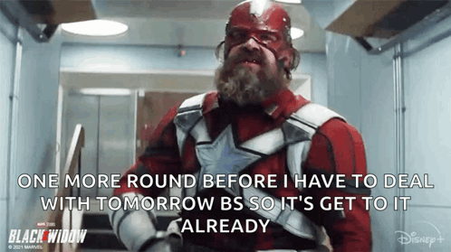 Man In Red And White Superhero Costume Standing In Hallway Quote GIF