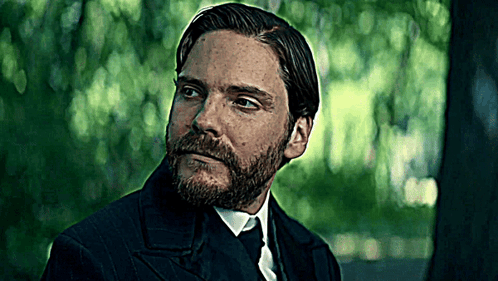 A Man With A Beard In A Suit And Tie GIF