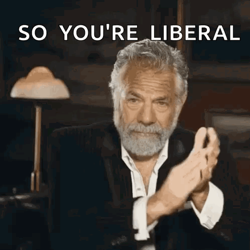 A Man With A Beard Is Clapping His Hands With The Words So You 'Re Liberal Above Him GIF