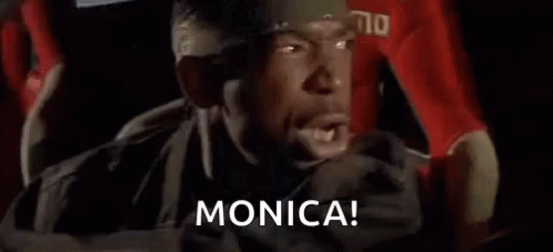 A Man With A Beard Is Driving A Car And Yelling At Someone . GIF