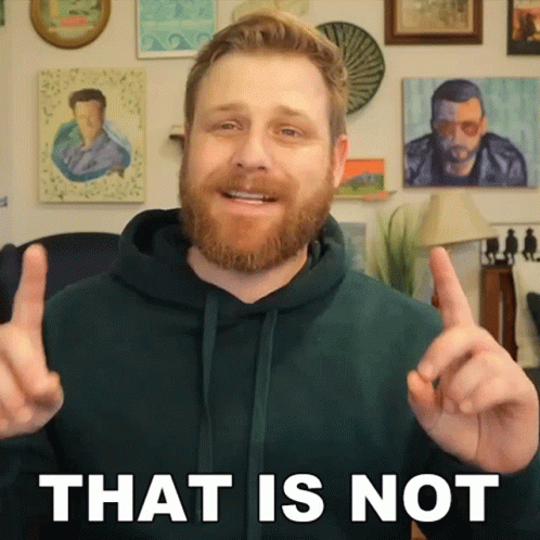 A Man With A Beard Is Giving A Thumbs Up And Says That Is Not GIF