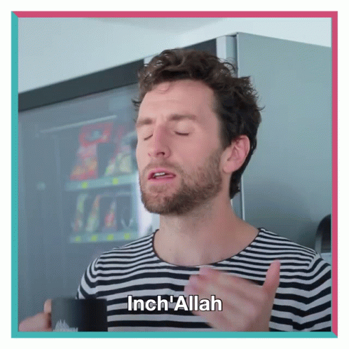 A Man With A Beard Is Holding A Cup And Says Inch Allah GIF