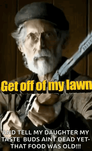 A Man With A Beard Is Holding A Gun With The Words Get Off Of My Lawn GIF