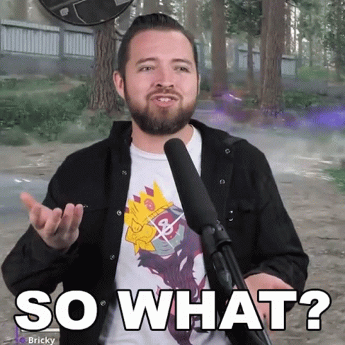 A Man With A Beard Is Holding A Microphone And Saying So What GIF
