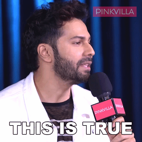 A Man With A Beard Is Holding A Pinkvilla Microphone And Says This Is True GIF