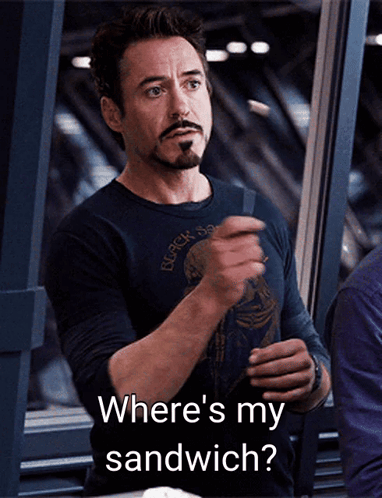 A Man With A Beard Is Holding A Sandwich And Says Where 'S My Sandwich GIF