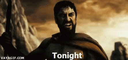 A Man With A Beard Is Holding A Spear And The Word Tonight Is Above Him GIF