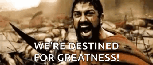 A Man With A Beard Is Holding A Sword And Screaming In A Movie Scene . GIF