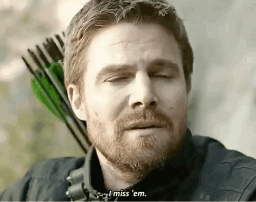 A Man With A Beard Is Holding An Arrow And Saying I Miss Em GIF