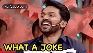 A Man With A Beard Is Laughing And Saying `` What A Joke '' . GIF