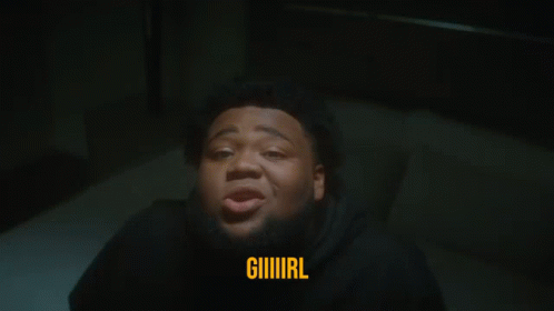 A Man With A Beard Is Laying On A Bed And The Word Giiiiirl Is Above Him GIF
