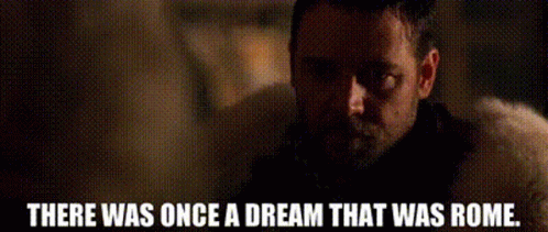 A Man With A Beard Is Looking At The Camera With The Words There Was Once A Dream That Was Rome Below Him . GIF