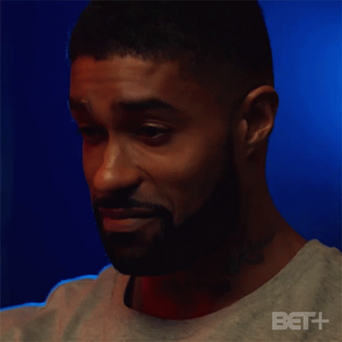 A Man With A Beard Is Making A Face And Saying Aight GIF