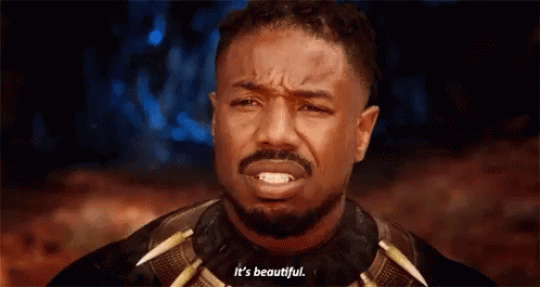 A Man With A Beard Is Making A Face And Saying `` It 'S Beautiful '' . GIF