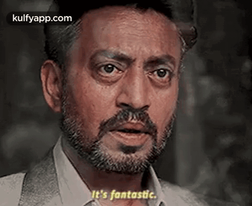 A Man With A Beard Is Making A Face And Saying `` It 'S Fantastic '' . GIF