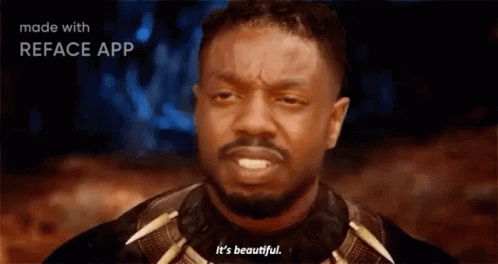 A Man With A Beard Is Making A Funny Face And Saying It 'S Beautiful . GIF