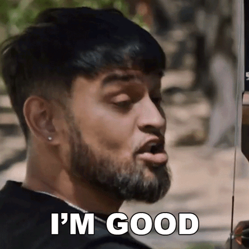 A Man With A Beard Is Making A Funny Face And Says `` I 'M Good '' . GIF