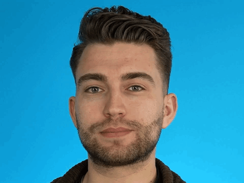 A Man With A Beard Is Making A Funny Face GIF