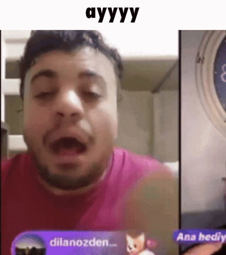 A Man With A Beard Is Making A Funny Face While Talking To Someone On A Video Call . GIF